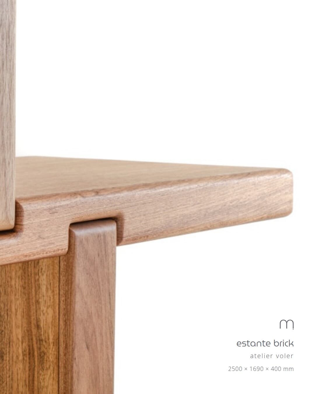 Carousel frame: close-up of the timber joint where shelf meets upright.